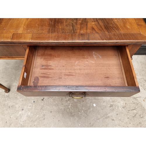 1763 - An Edwardian mahogany two drawer side table, 106cm wide. 