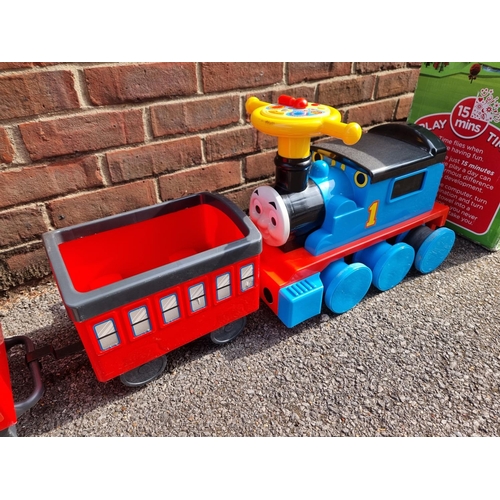 1766 - A Chad Valley child's ride-on electric train set, boxed; together with a Thomas & Friends r... 