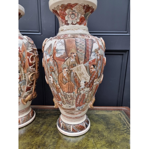 1775 - A large pair of Japanese Satsuma vases, 63cm high, (one a.f).