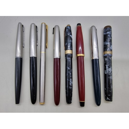 1621 - Eight various pens, two with 14k nibs.