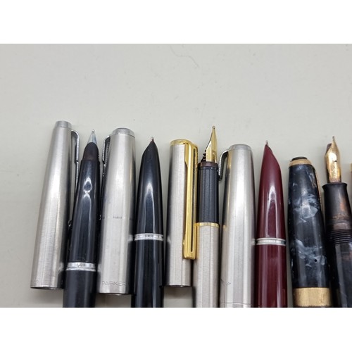 1621 - Eight various pens, two with 14k nibs.