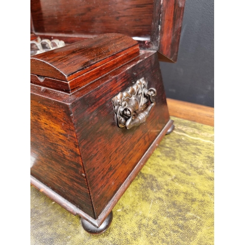 1115 - An early Victorian rosewood sarcophagus tea caddy, 37cm wide, (cut glass mixing bowl riveted). ... 