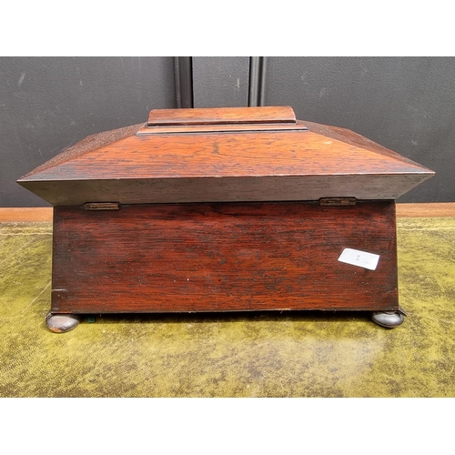 1115 - An early Victorian rosewood sarcophagus tea caddy, 37cm wide, (cut glass mixing bowl riveted). ... 