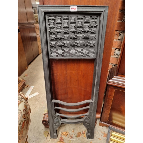 1265 - An Aesthetic cast iron fire inset, possibly by Thomas Jeckyll, 91.5 x 34.5cm. 