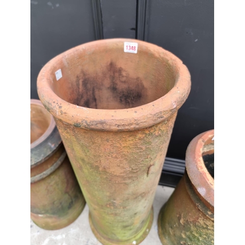 1348 - Four various terracotta chimney pots, largest 76cm high. 