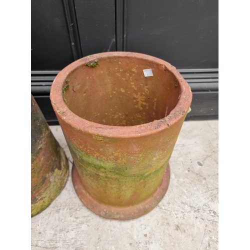 1348 - Four various terracotta chimney pots, largest 76cm high. 