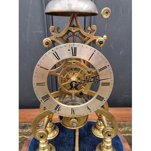 1411 - A skeleton clock, with glass dome, total height 38.5cm high, with pendulum, (lacking hour hand)... 