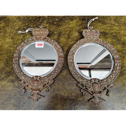 1668 - An interesting pair of antique French bronze wall mirrors, 31 x 20cm.