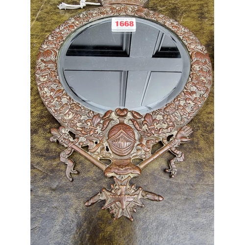 1668 - An interesting pair of antique French bronze wall mirrors, 31 x 20cm.