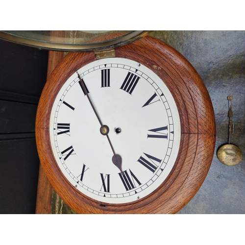 1689 - An oak wall clock, with 11 3/4in painted dial, and pendulum.