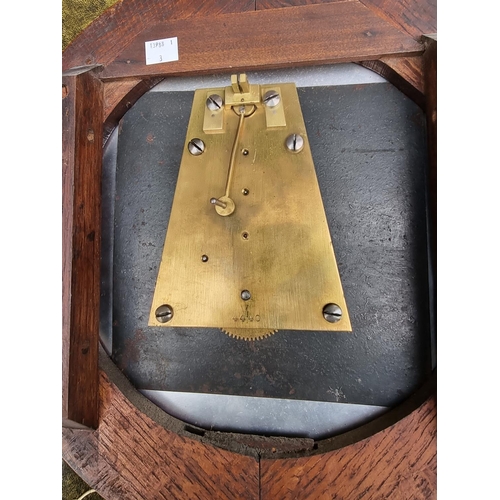 1689 - An oak wall clock, with 11 3/4in painted dial, and pendulum.