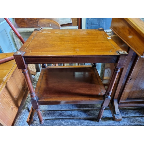 1754 - A Victorian mahogany Pembroke table, 105cm wide; together with a beech and cane rocking chair; ... 