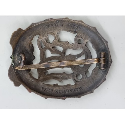 1651 - A German Third Reich 1937 pattern bronze DRL sports badge, inscribed 'Wernstein Jena', 4.8cm.... 