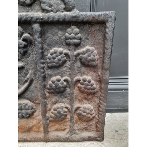 1351 - An antique cast iron 'Armada' fireback, dated 1588 and initialled IFC, 67 x 75cm. ... 