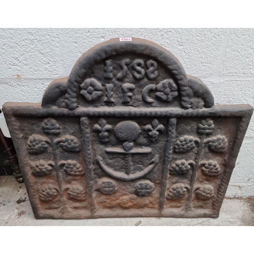 1351 - An antique cast iron 'Armada' fireback, dated 1588 and initialled IFC, 67 x 75cm. ... 