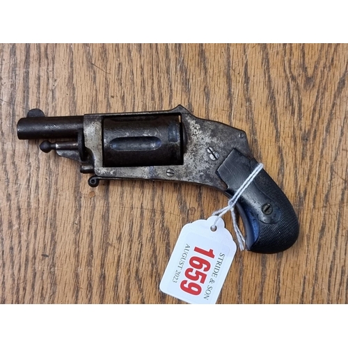 1659 - A 19th century pocket revolver. (no licence required)