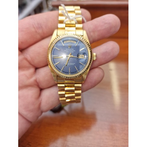 233 - A circa 1975 Rolex 'President' Oyster Perpetual Day-Date 18ct gold wristwatch, blue dial,  36mm, Ref... 