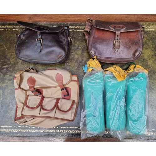 1596 - Sporting: two vintage leather cartridge bags; together with a fishing bag and three Turner Richards ... 