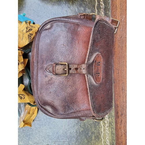 1596 - Sporting: two vintage leather cartridge bags; together with a fishing bag and three Turner Richards ... 