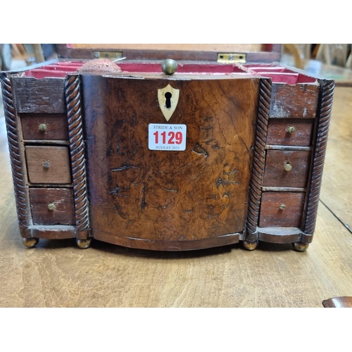 1129 - A very unusual late 18th century walnut and inlaid bowfront workbox, possibly Irish, the interior wi... 