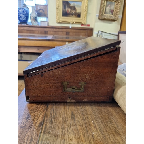 1136 - An unusual George III mahogany and inlaid writing slope, with bone knobs, 41cm wide.... 