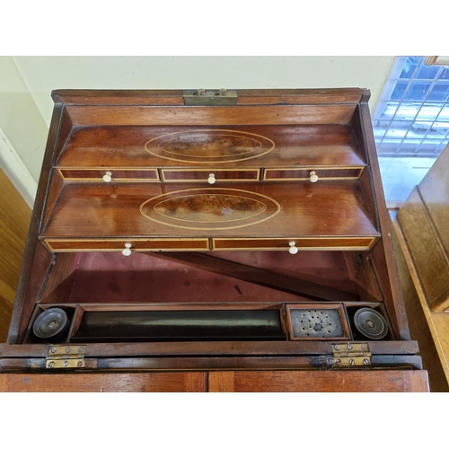 1136 - An unusual George III mahogany and inlaid writing slope, with bone knobs, 41cm wide.... 