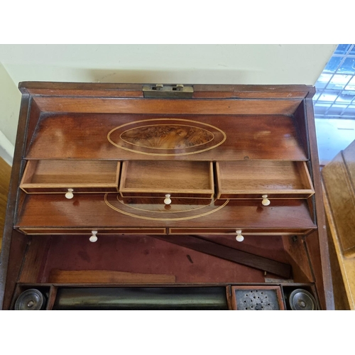 1136 - An unusual George III mahogany and inlaid writing slope, with bone knobs, 41cm wide.... 