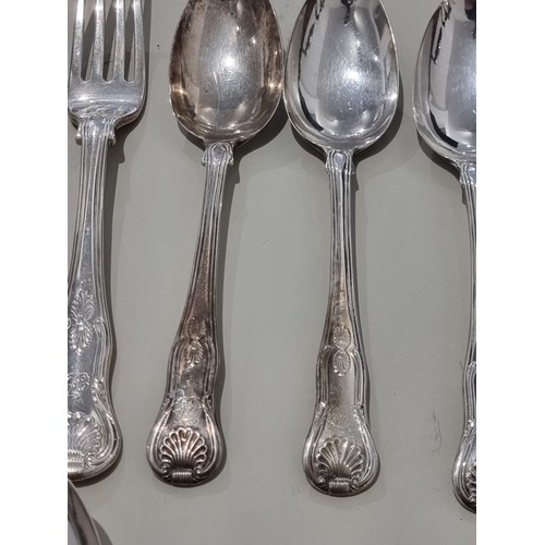 80A - A part canteen of George IV king's pattern cutlery, comprising; eleven table forks, ten dessert fork... 