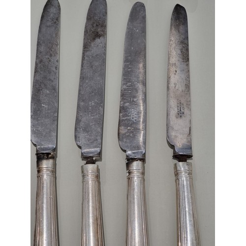 70A - A set of ten George IV dinner knives, by Francis Higgins, London 1820; together with nine matching s... 