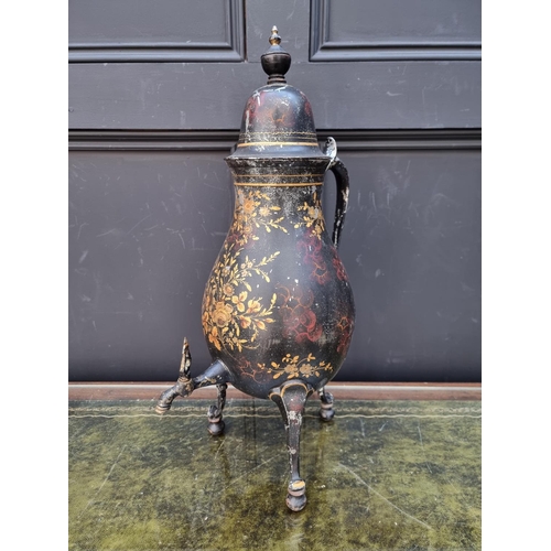 1151 - An early 19th century Pontypool toleware tea urn and cover, 51cm high.