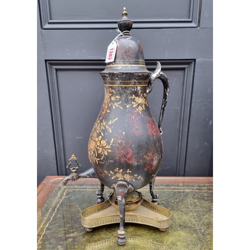 1151 - An early 19th century Pontypool toleware tea urn and cover, 51cm high.