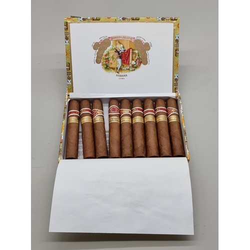 131 - Nine Romeo y Julieta Wide Churchill cigars, in box dated Ago 12.These cigars have been aged for over... 