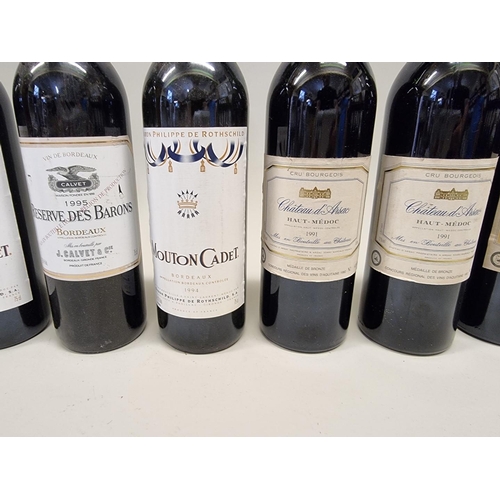 94 - Nine 75cl bottles of red Bordeaux, to include: five Chateau d'Arsac, Haut-Medoc, 1991; and two Mouto... 