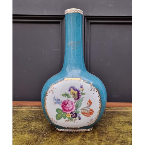 1416 - A large Continental porcelain bottle vase, painted with flowers against a powder blue ground, 37cm h... 