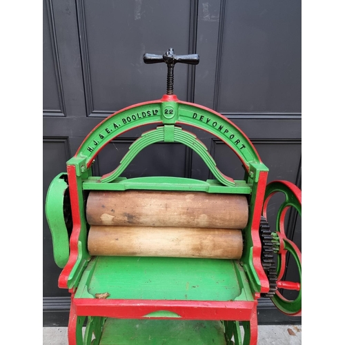 1002 - A Victorian green and red painted mangle, by 'H J & E A Boolds Ltd, Devonport', 154cm high. ... 