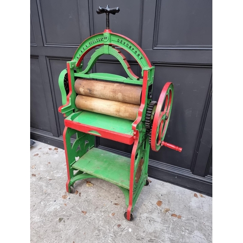 1002 - A Victorian green and red painted mangle, by 'H J & E A Boolds Ltd, Devonport', 154cm high. ... 