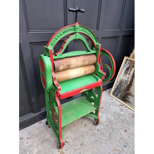 1002 - A Victorian green and red painted mangle, by 'H J & E A Boolds Ltd, Devonport', 154cm high. ... 