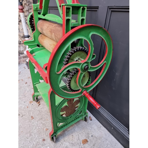 1002 - A Victorian green and red painted mangle, by 'H J & E A Boolds Ltd, Devonport', 154cm high. ... 