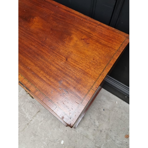 1005 - A George III mahogany and crossbanded chest, of two short and two long drawers, 91cm wide.... 