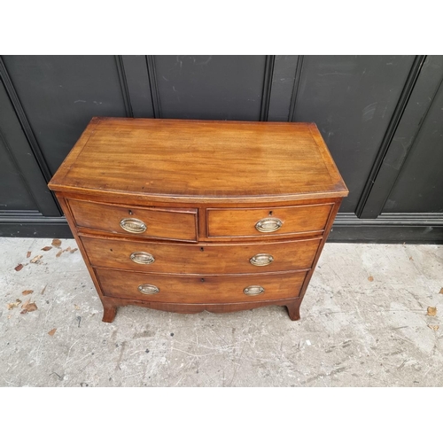 1006 - An early 19th century mahogany bowfront chest, of two short and two long drawers, 91cm wide.... 