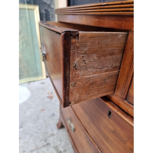 1006 - An early 19th century mahogany bowfront chest, of two short and two long drawers, 91cm wide.... 