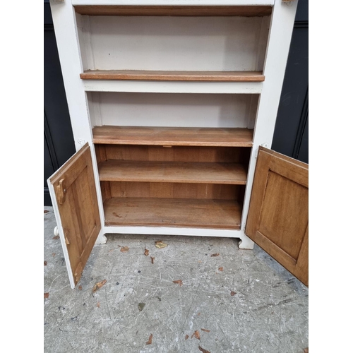 1007 - A white painted oak side cabinet, 97.5cm wide.