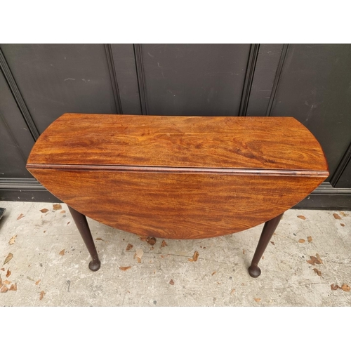 1034 - An 18th century mahogany gateleg table, of good colour, 106cm wide. 