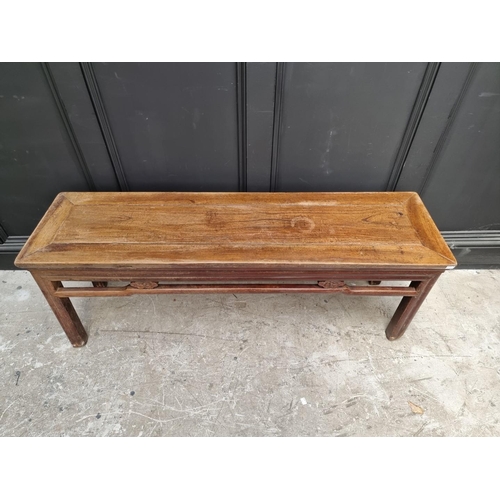 1036 - An antique Chinese hardwood alter style table, 133.5cm wide, (probably reduced in height).... 