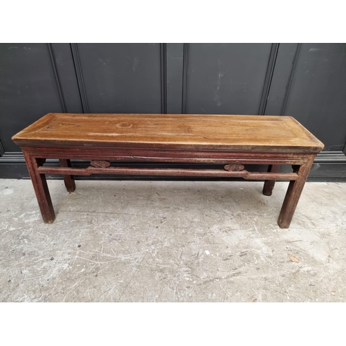 1036 - An antique Chinese hardwood alter style table, 133.5cm wide, (probably reduced in height).... 