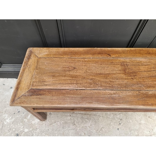 1036 - An antique Chinese hardwood alter style table, 133.5cm wide, (probably reduced in height).... 