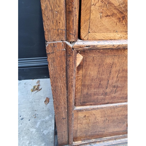 1042 - An 18th century oak and walnut chest of drawers, 93cm wide, (in two parts). ... 