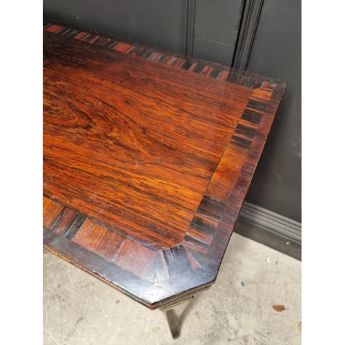 1047 - An early 19th century rosewood and coromandel card table, with double gateleg, 91.5cm wide. ... 