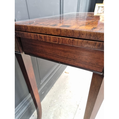 1047 - An early 19th century rosewood and coromandel card table, with double gateleg, 91.5cm wide. ... 