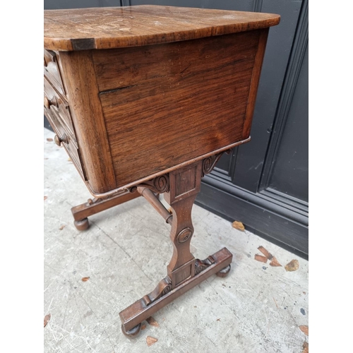 1052 - An early Victorian rosewood work table, 50cm wide.